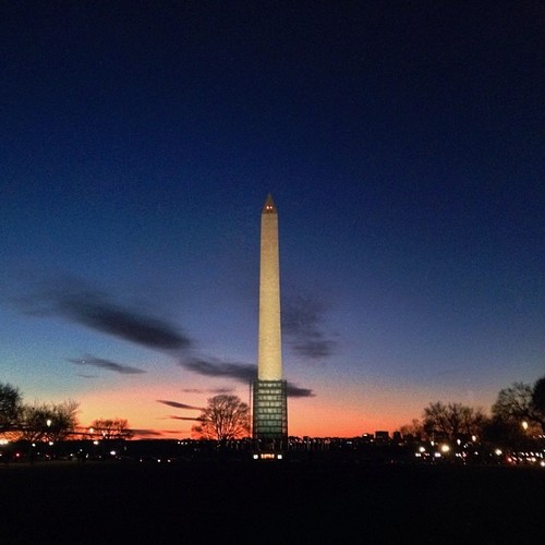 The sun setting on Jan. 1, 2014 behind the Washington Monument in Washington, D.C.